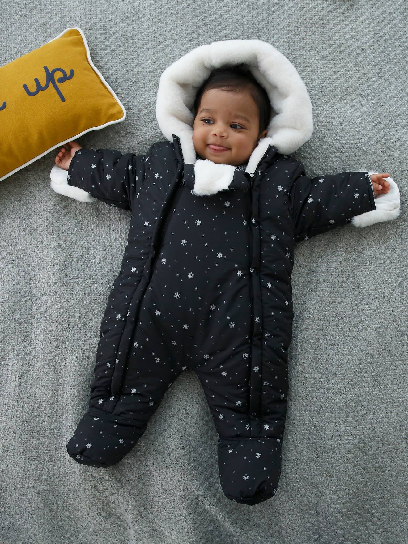 baby in a snowsuit
