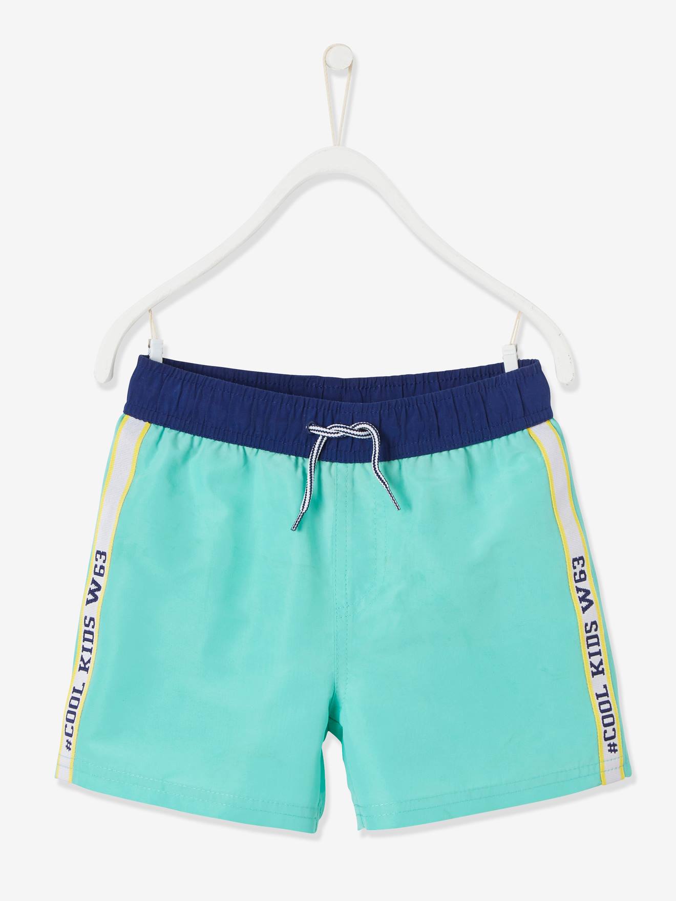 boys green swim trunks