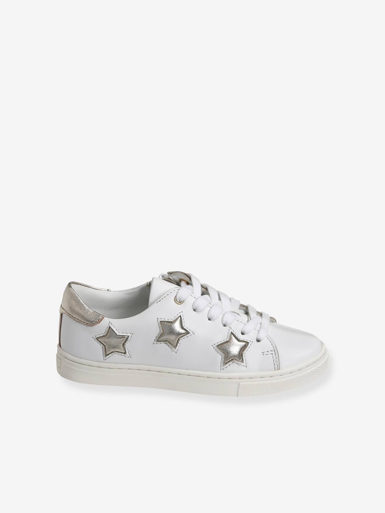 White trainers with shop stars on them